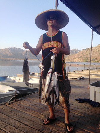 Sonny Bihis Chula Vista 25 June 2016 4 trout 4 Cats Nightcrawler on log boom sm.jpg